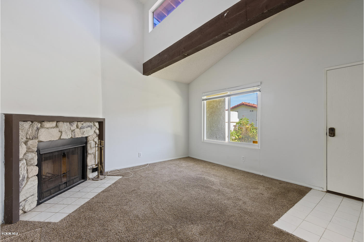 432 East Bard Road Oxnard, CA 93033 - Photo 6 of 20 a view of an empty room with window and fire place