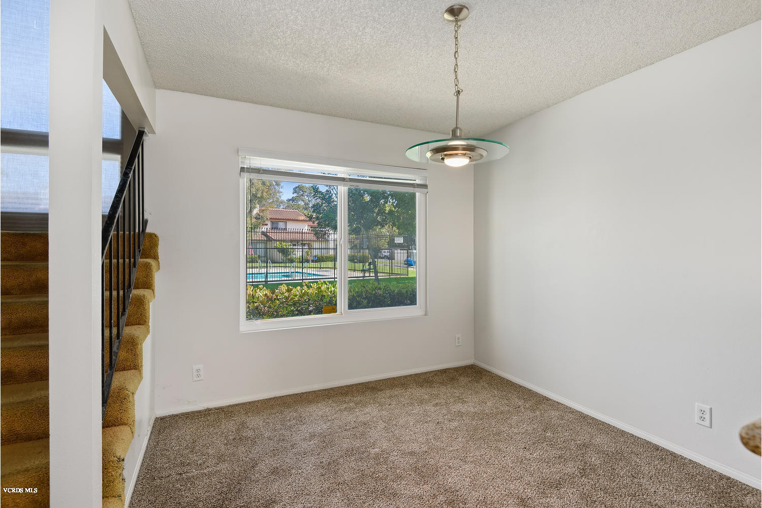 432 East Bard Road Oxnard, CA 93033 - Photo 9 of 20 a view of an empty room with a window
