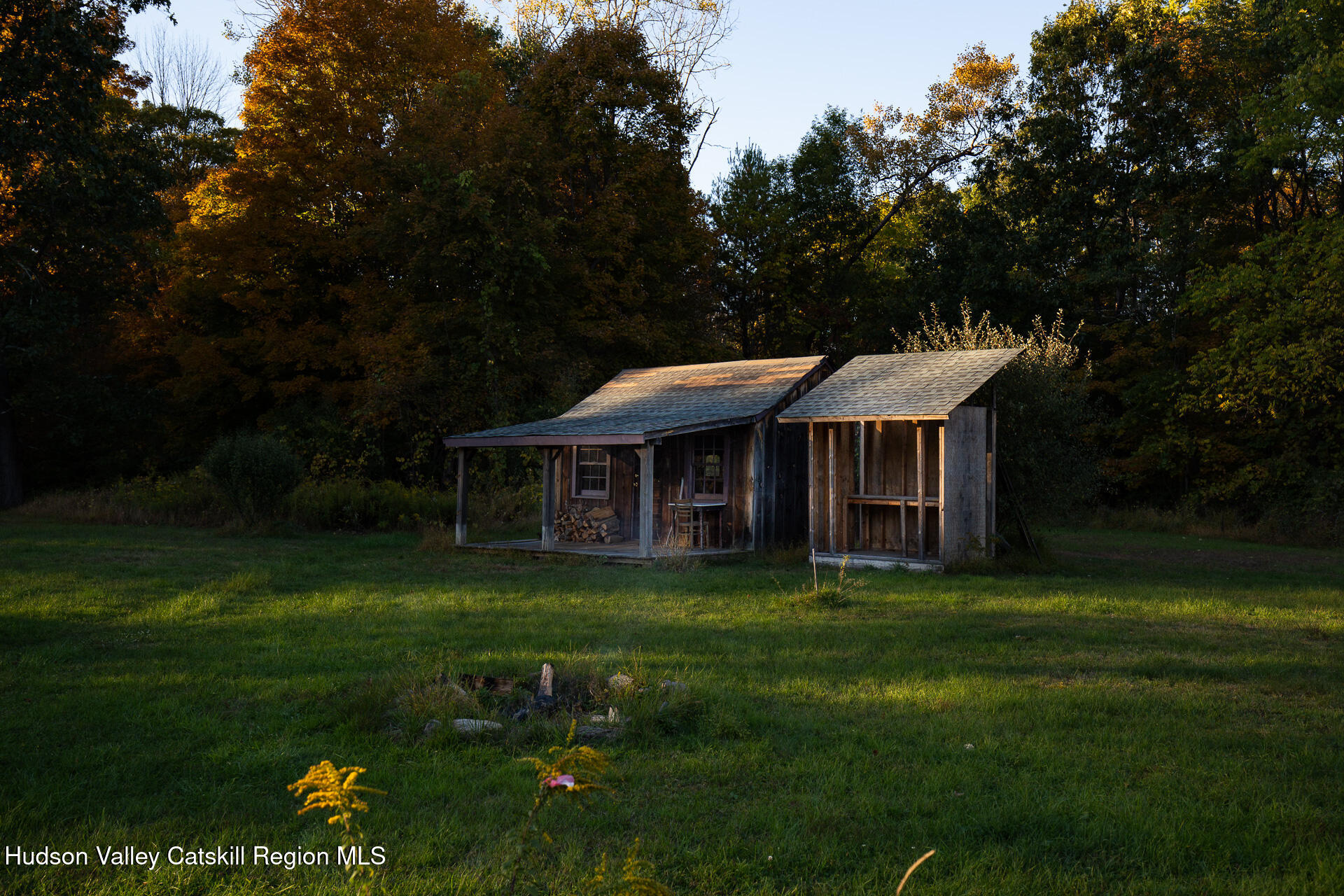 464 Mill Hook Road Accord, NY 12404 - Photo 9 of 14 a backyard of a house with table and chairs