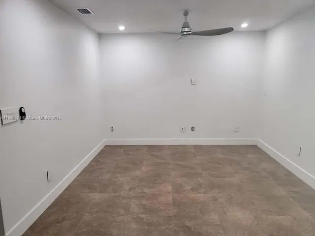 a view of a room with an empty space