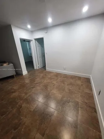 an empty room with a door