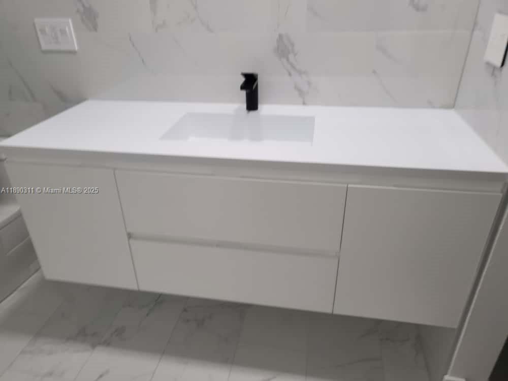 1236 North Hiatus Road, Unit 1236 Pembroke Pines, FL 33026 - Photo 2 of 19 a close view of sink