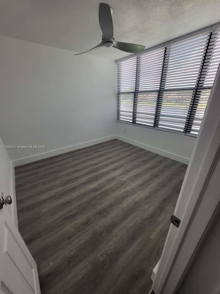 1236 North Hiatus Road, Unit 1236 Pembroke Pines, FL 33026 - Photo 4 of 19 a view of empty room with windows