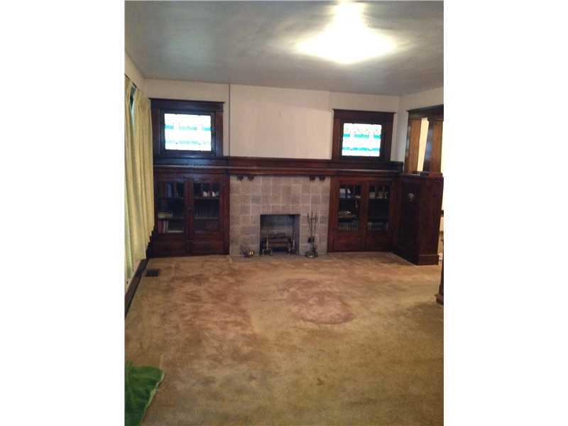 529 Roup Street Tarentum, PA 15084 - Photo 3 of 15 Living Room. Beautiful stained glass windows, built in bookcases and original woodwork!