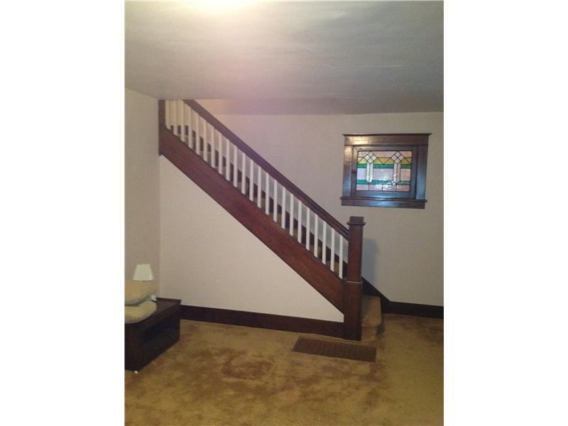 529 Roup Street Tarentum, PA 15084 - Photo 4 of 15 Living Room. Staircase leading to 2nd level