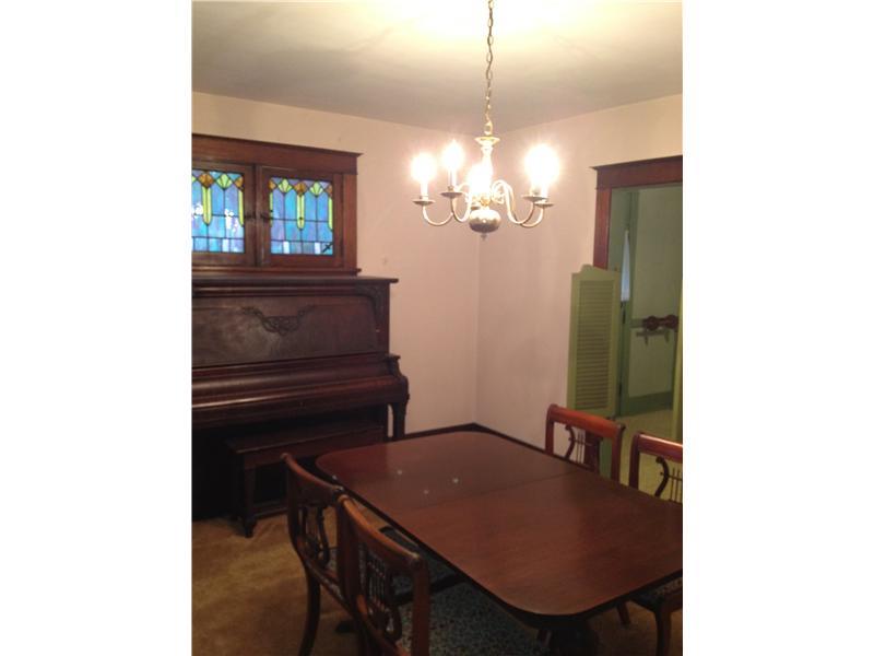 529 Roup Street Tarentum, PA 15084 - Photo 5 of 15 Dining Room. Stained glass windows...piano included in sale!
