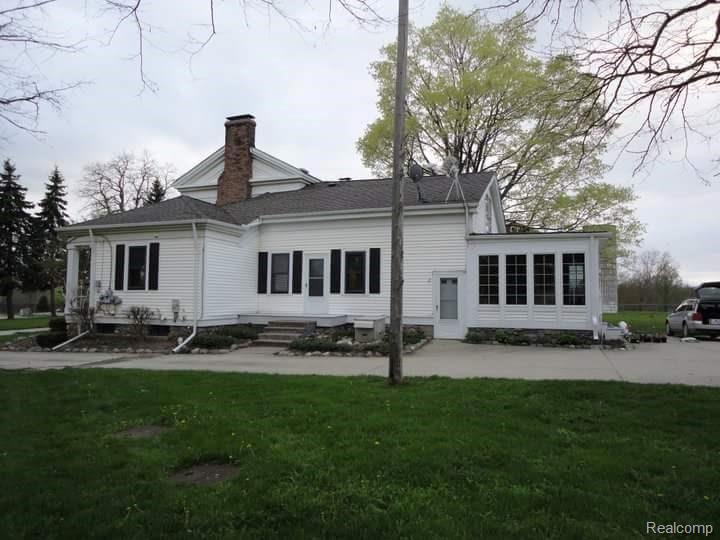 3505 31 Mile Road Washington, MI 48095 - Photo 13 of 17 side view of house.JPG
