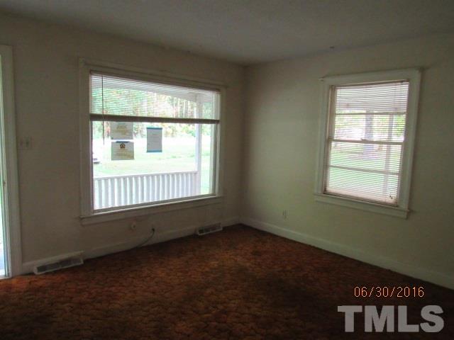 3444 Wiggins Road Spring Hope, NC 27882 - Photo 12 of 14 an empty room with a window