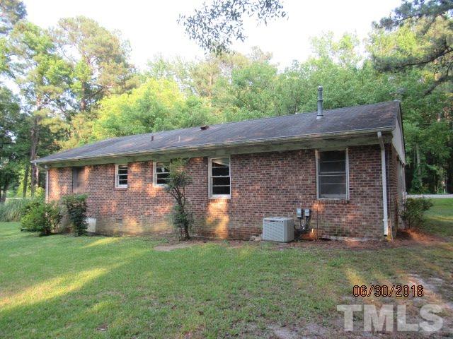 3444 Wiggins Road Spring Hope, NC 27882 - Photo 3 of 14 front view of a house with a yard