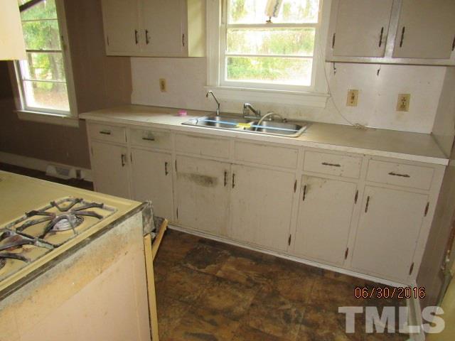 3444 Wiggins Road Spring Hope, NC 27882 - Photo 6 of 14 a utility room with sink dryer and washer