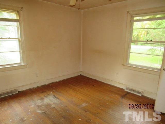3444 Wiggins Road Spring Hope, NC 27882 - Photo 8 of 14 an empty room with a window