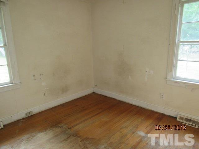 3444 Wiggins Road Spring Hope, NC 27882 - Photo 9 of 14 an empty room with a window