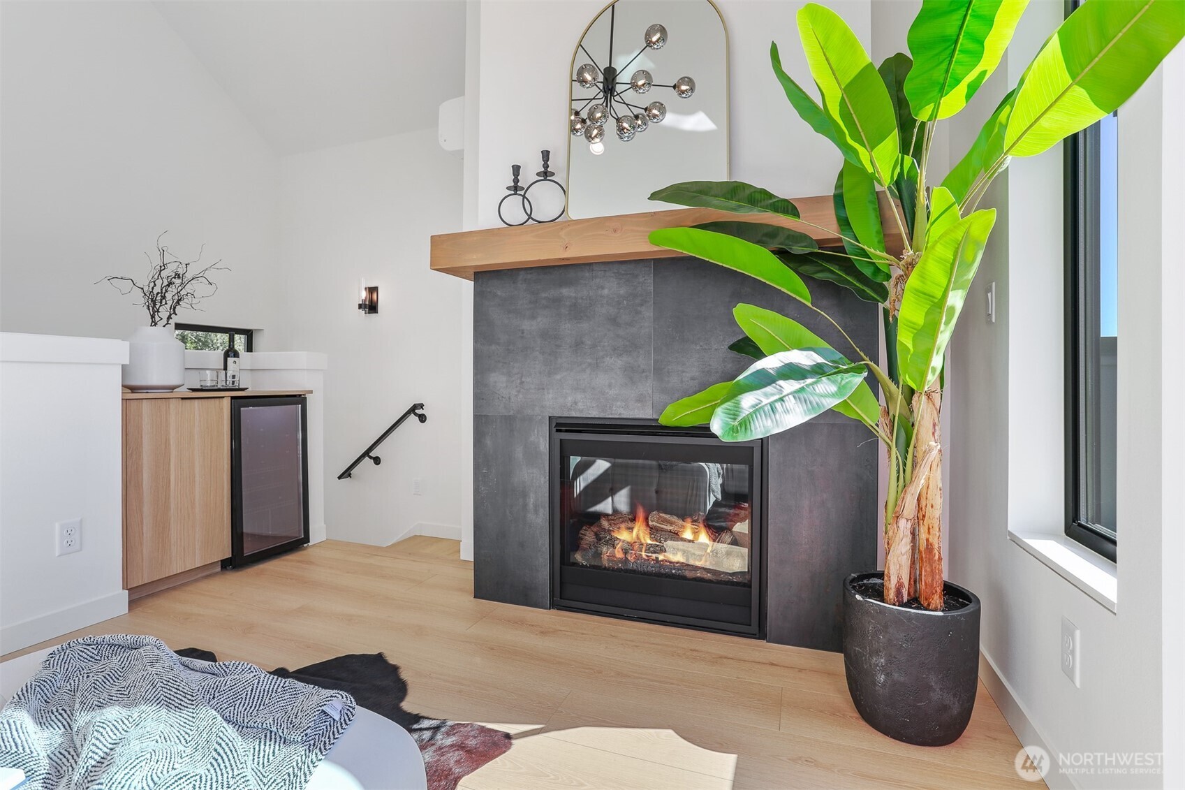 8750 13th Avenue Northwest, Unit B Seattle, WA 98117 - Photo 14 of 28 a living room with furniture and a fireplace