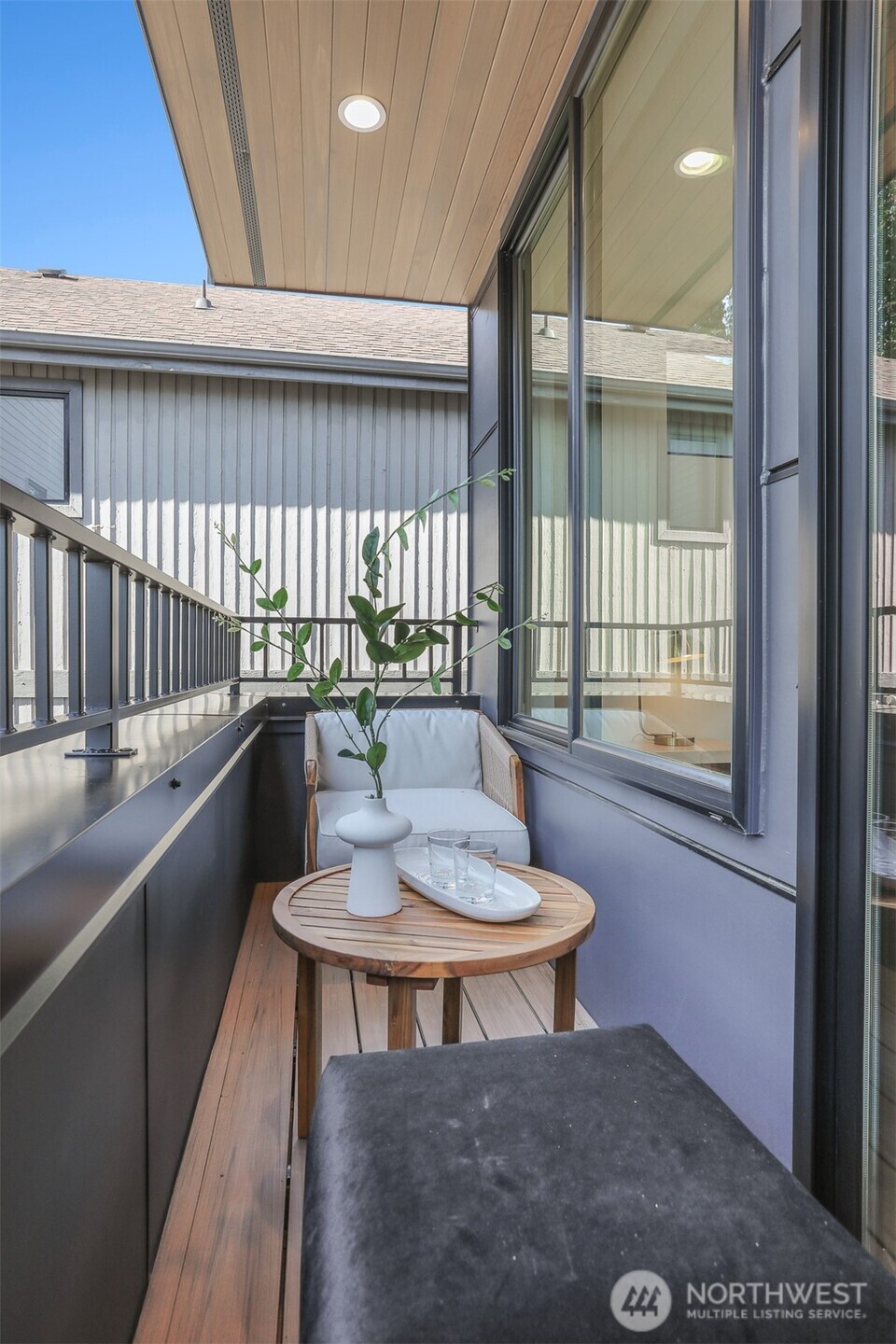 8750 13th Avenue Northwest, Unit B Seattle, WA 98117 - Photo 21 of 28 a kitchen with a table chairs and a window