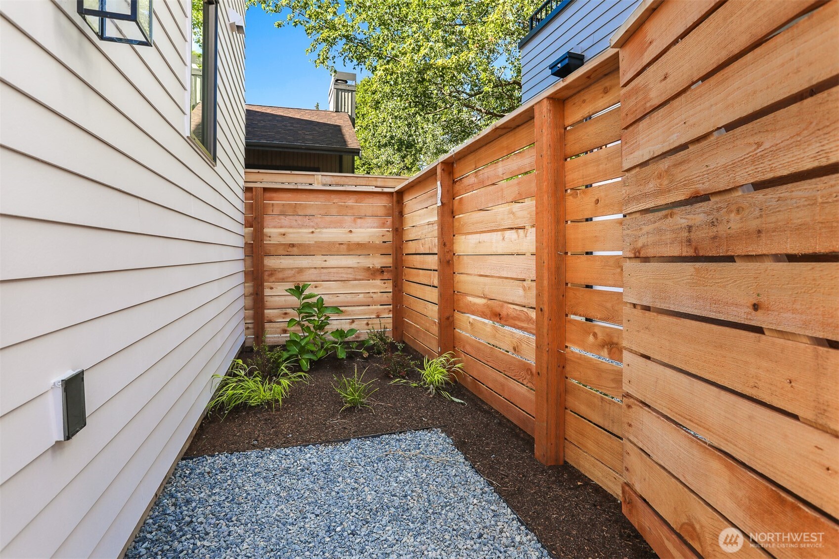 8750 13th Avenue Northwest, Unit B Seattle, WA 98117 - Photo 27 of 28 a view of a pathway of a house
