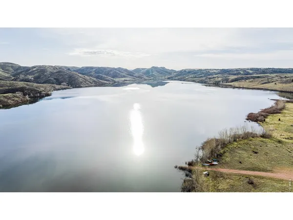 a black and white photo of a lake