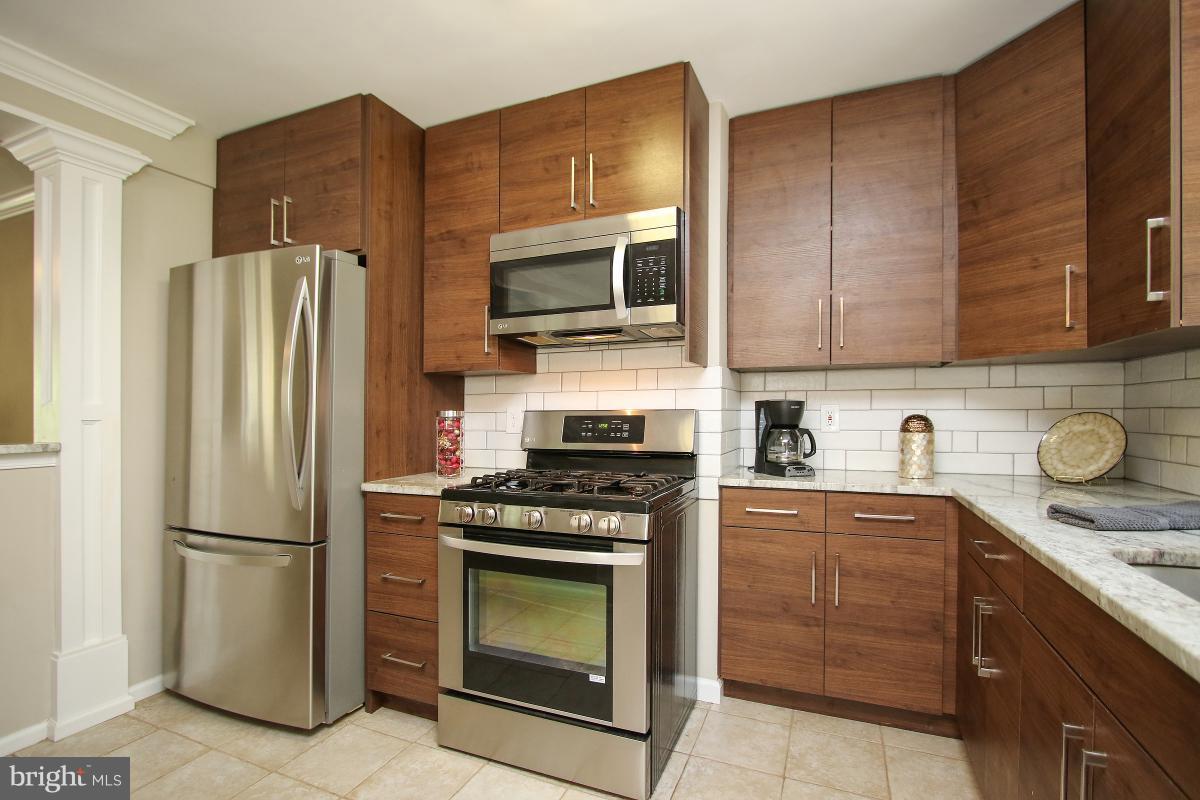 4043 Adams Drive Silver Spring, MD 20902 - Photo 10 of 30 Kitchen with stainless steel appliances