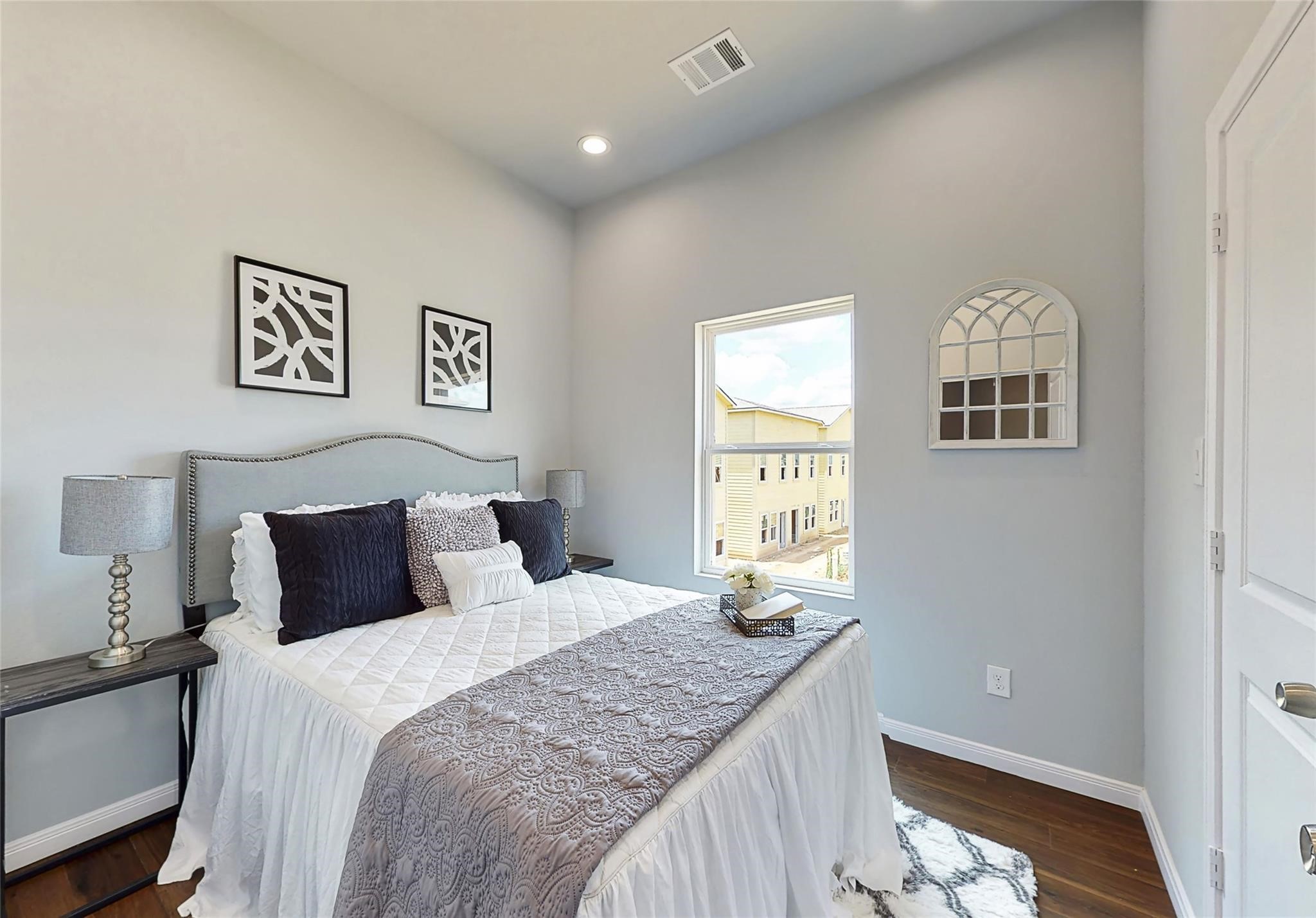 18813 Luminescent Lane Spring, TX 77379 - Photo 16 of 19 a bedroom with a bed and a window