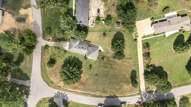an aerial view of residential house with outdoor space