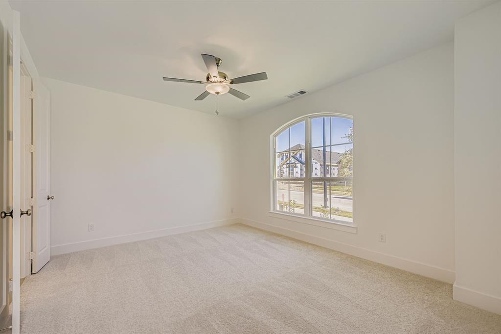 6036 Davis Knoll Road Fort Worth, TX 76126 - Photo 16 of 29 wooden floor in an empty room with a window