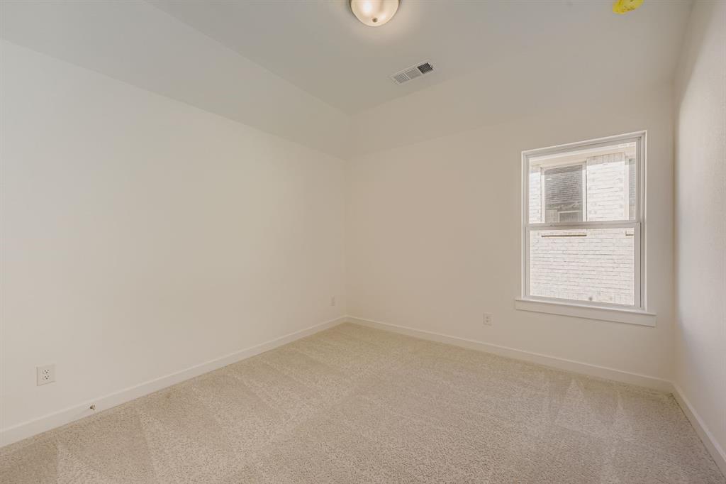 6036 Davis Knoll Road Fort Worth, TX 76126 - Photo 24 of 29 an empty room with a window