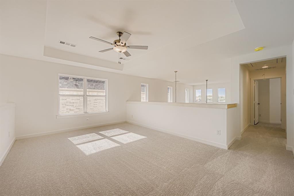 6036 Davis Knoll Road Fort Worth, TX 76126 - Photo 25 of 29 a view of an empty room with a window