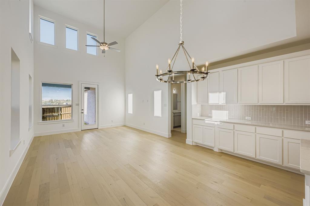 6036 Davis Knoll Road Fort Worth, TX 76126 - Photo 10 of 29 a view of a kitchen with a sink and cabinet area