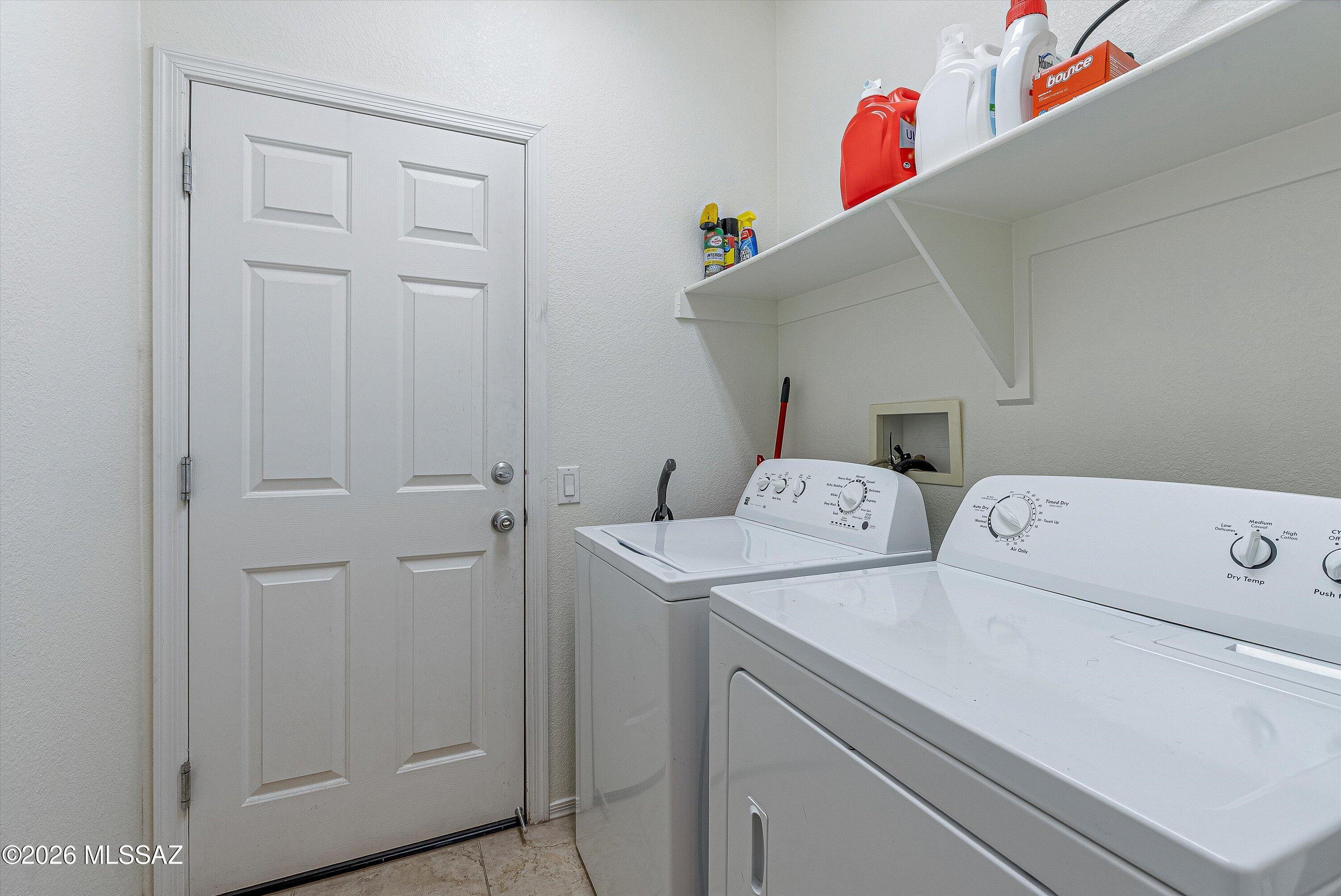 21163 East Treasure Road Red Rock, AZ 85145 - Photo 19 of 35 a utility room with dryer and washer