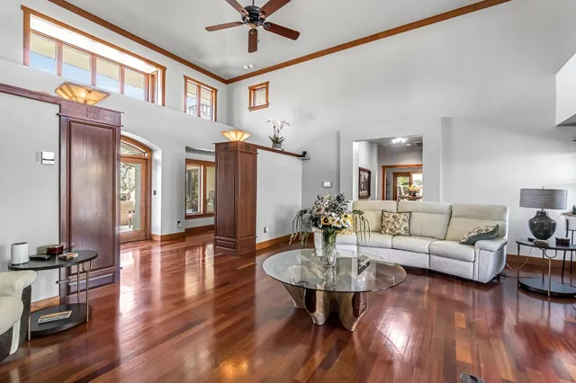 a kitchen with stainless steel appliances granite countertop a stove refrigerator sink and cabinets