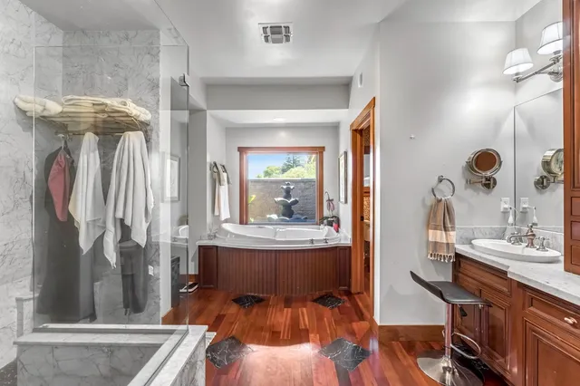 a swimming pool with outdoor seating and yard