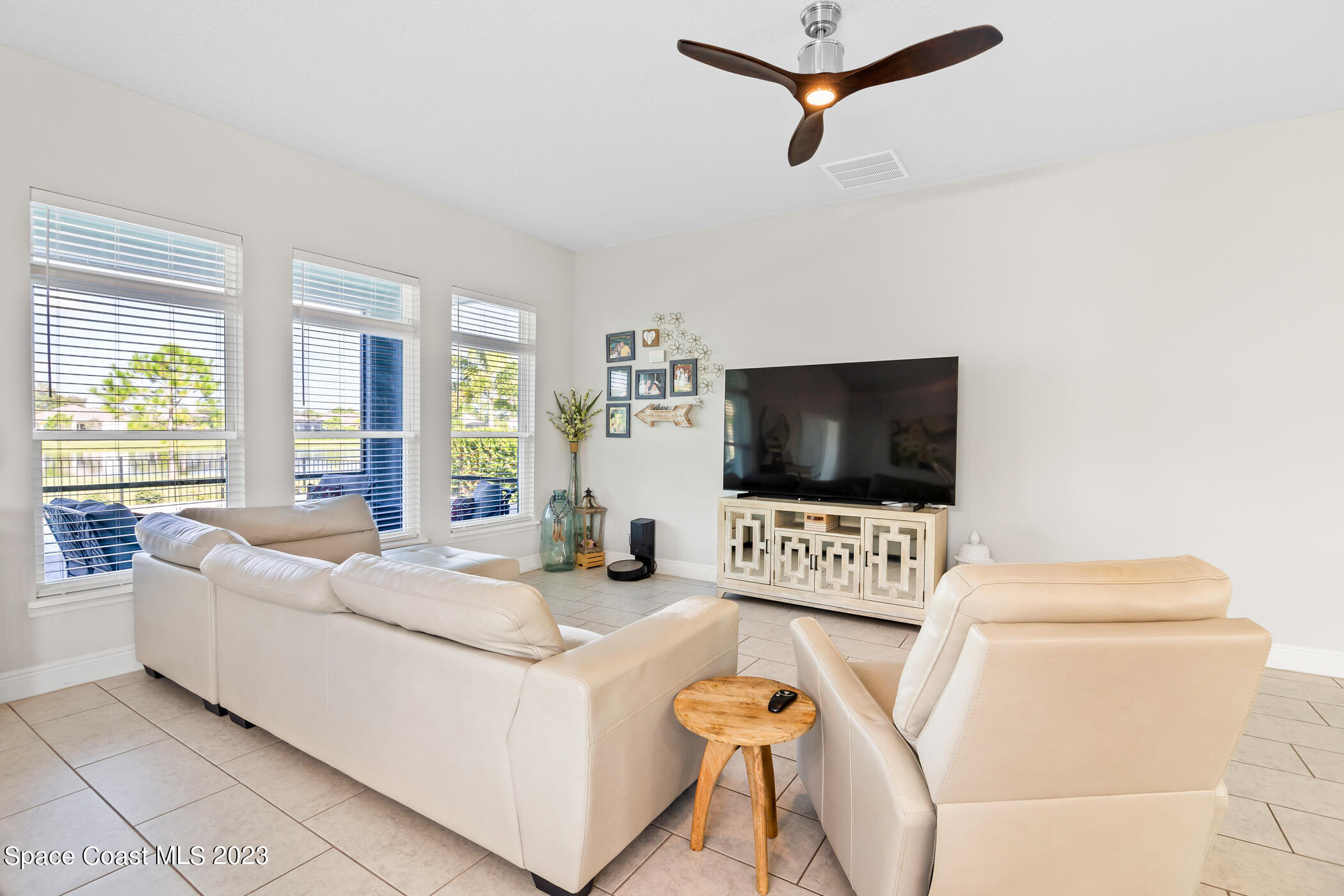 4475 Ruthann Circle Melbourne, FL 32934 - Photo 14 of 45 Great Room View To Pool