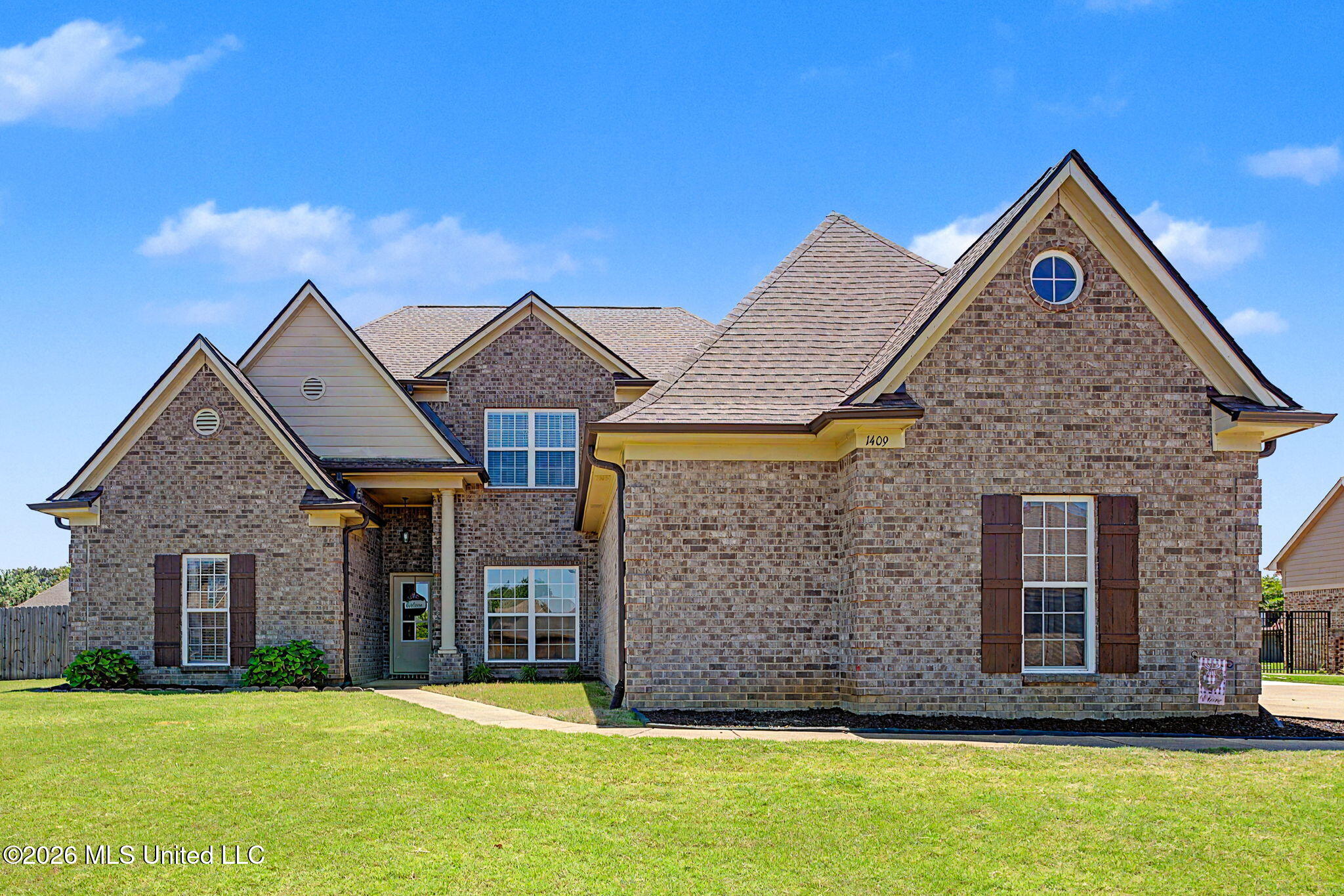 1409 Monteith Avenue Hernando, MS 38632 - Photo 1 of 36 Front of House