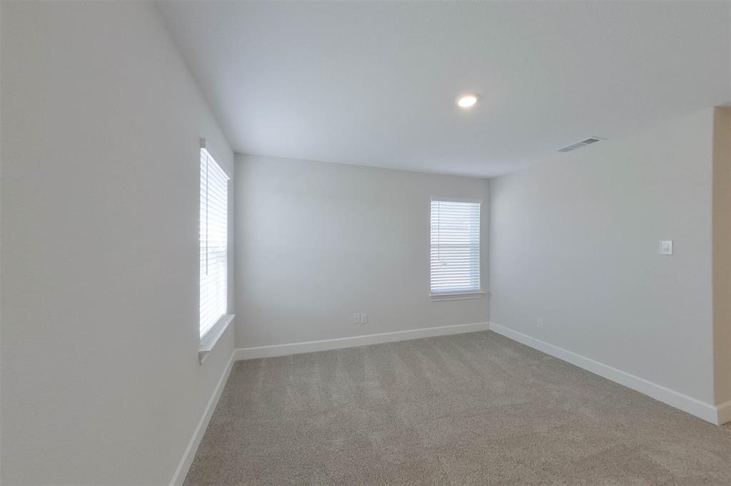 1206 Dye Boulevard Princeton, TX 75407 - Photo 20 of 29 an empty room with windows