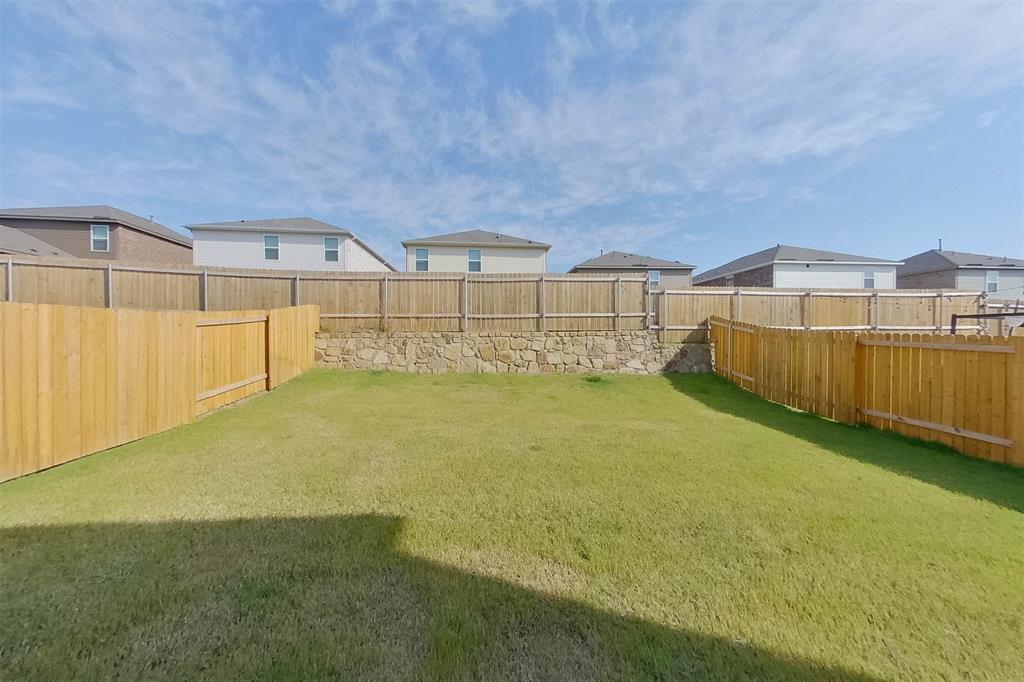 1206 Dye Boulevard Princeton, TX 75407 - Photo 22 of 29 a view of a backyard