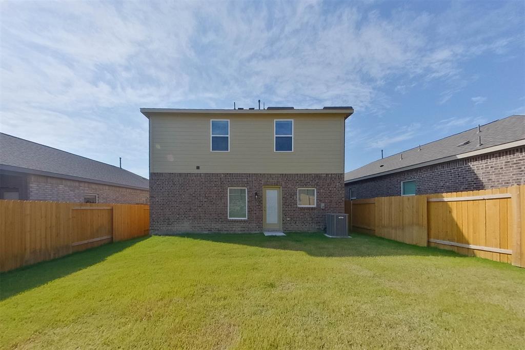1206 Dye Boulevard Princeton, TX 75407 - Photo 23 of 29 a view of a house with a backyard