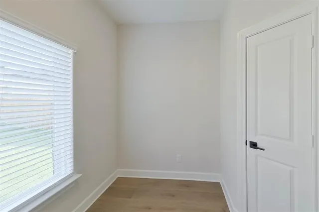 a view of small space with wooden floor