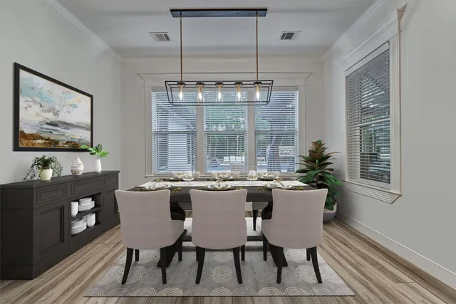 a view of a dining room with furniture window and outside view