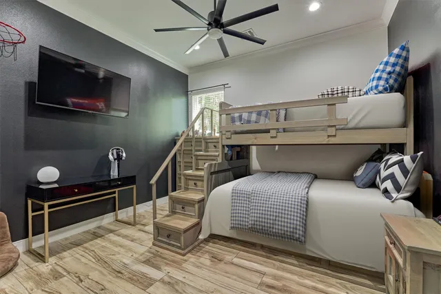 a bedroom with a bed and dresser