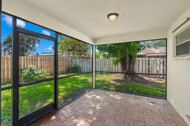 a view of a porch with a backyard