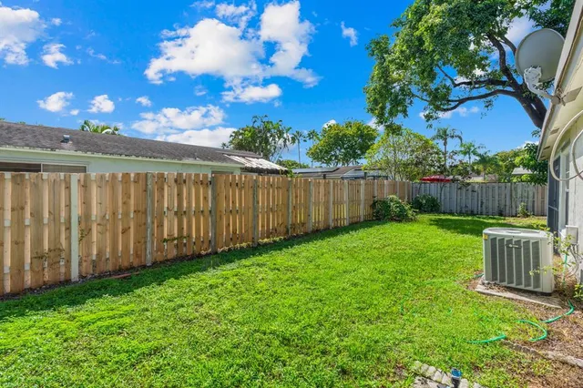 a view of a backyard with a garden
