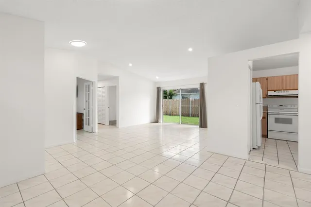 a view of an empty room and window