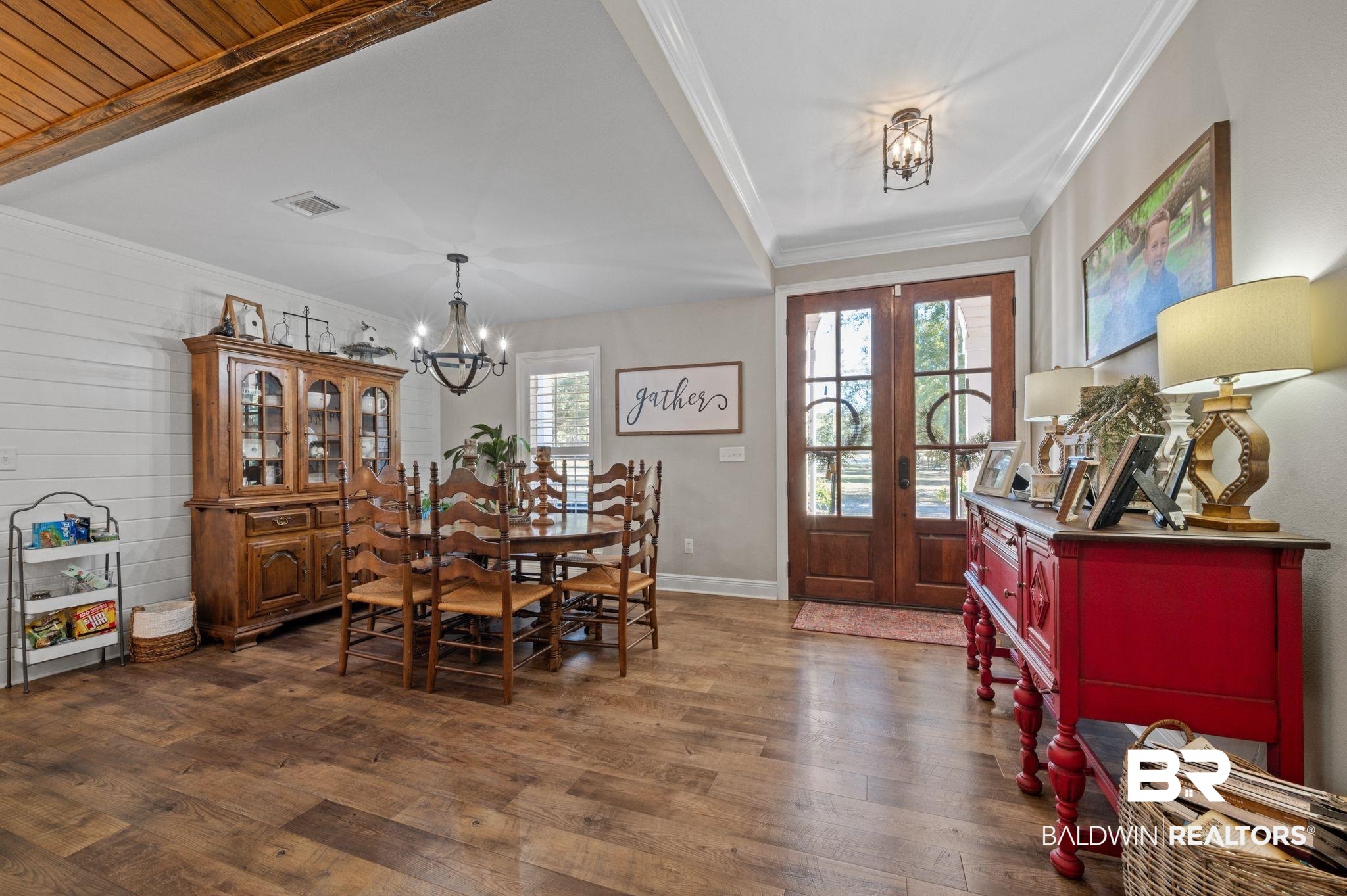 38211-d) V R Byrd Road Bay Minette, AL 36507 - Photo 3 of 58 Dining area featuring french doors, a healthy amount of sunlight, and dark hardwood / wood-style floors