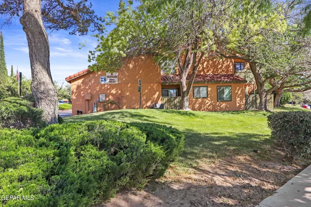 a view of building with yard