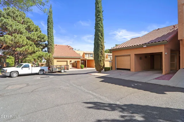 a view of a garden with a houses