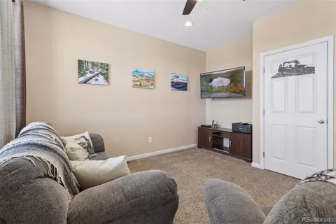 a living room with furniture and a couch