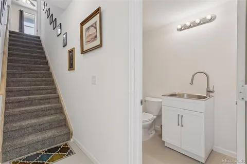 a view of staircase with white walls