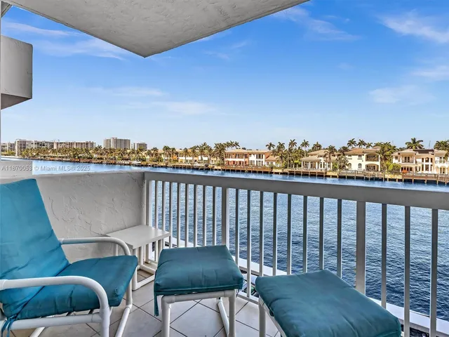 a view of balcony with furniture