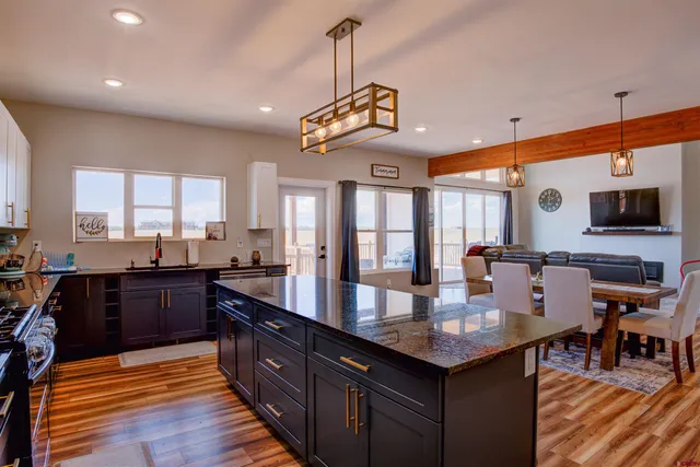 a kitchen with granite countertop lots of counter top space