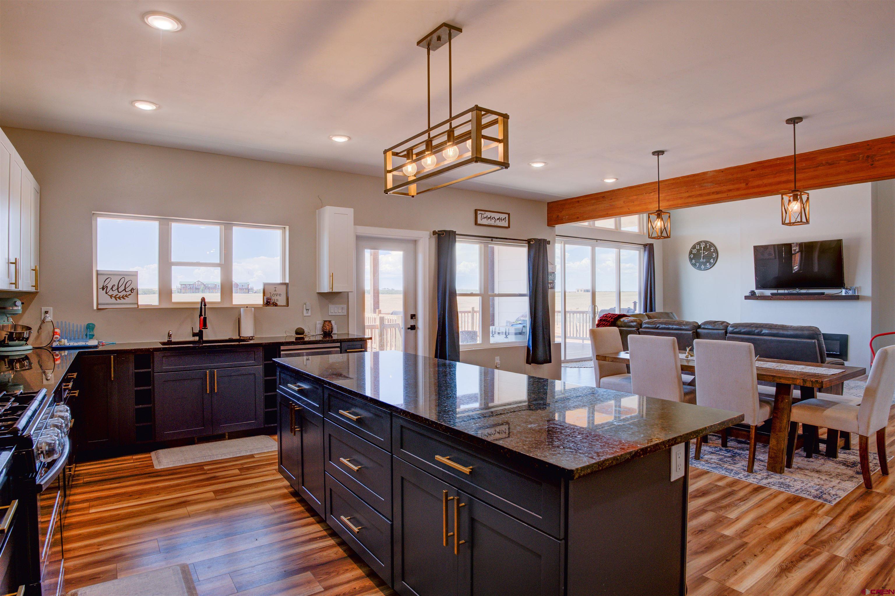 13205 Road 17.9 Loop Cortez, CO 81321 - Photo 13 of 35 a kitchen with granite countertop lots of counter top space