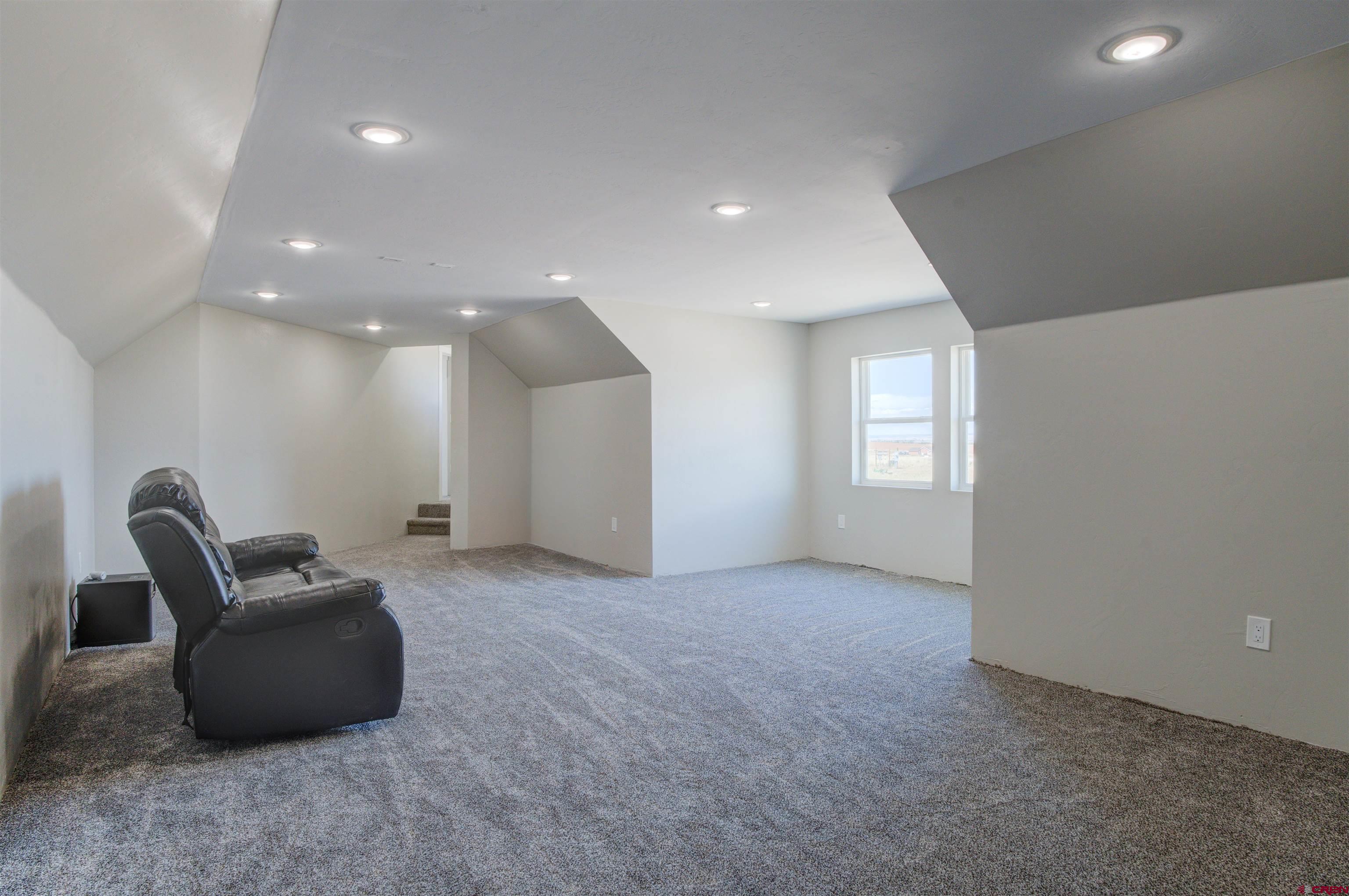 13205 Road 17.9 Loop Cortez, CO 81321 - Photo 17 of 35 a view of a livingroom with furniture and windows
